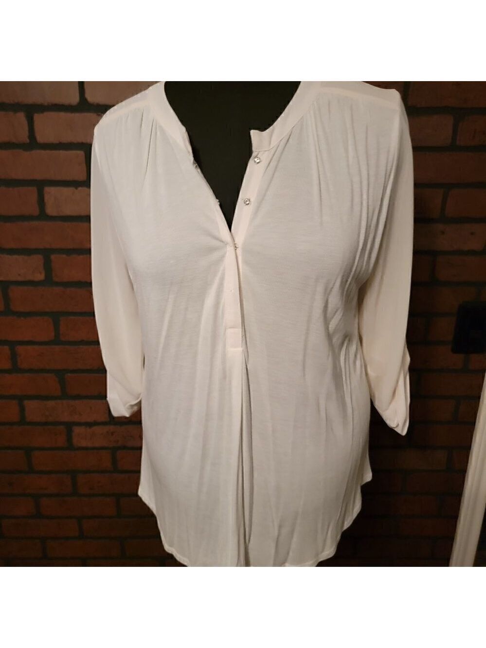 Nine West mixed material top. Size LG. Pit to Pit 21". Cream color Henley